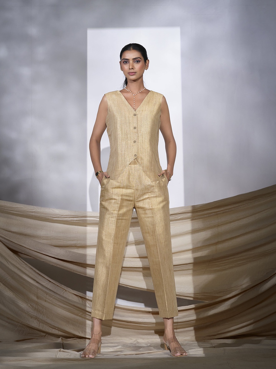 

TANNAH Women Solid Sleeveless Basic Jumpsuit, Beige