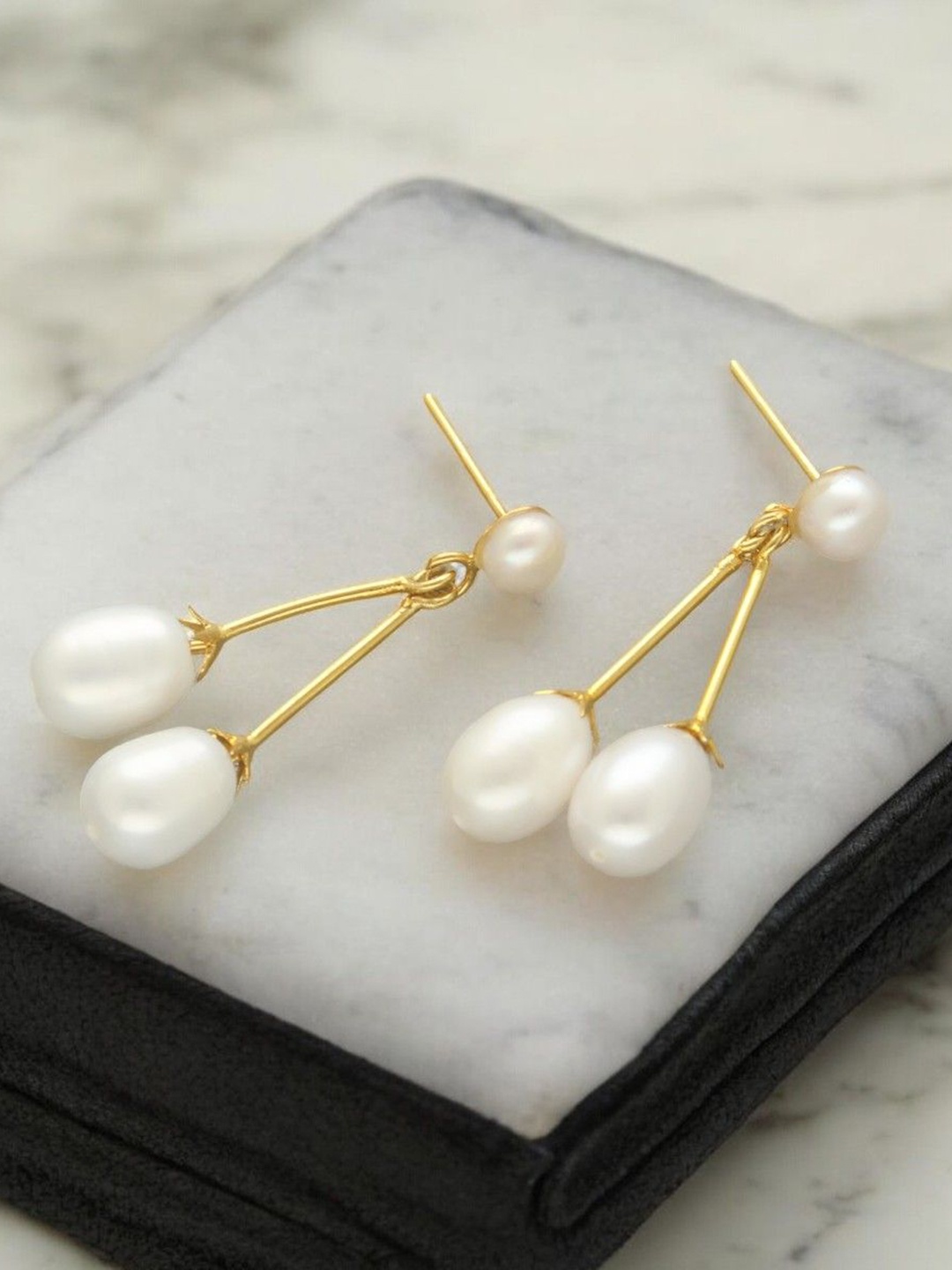 

Sri Jagdamba Pearls Dealer Gold-Plated Contemporary Pearls Drop Earrings, White