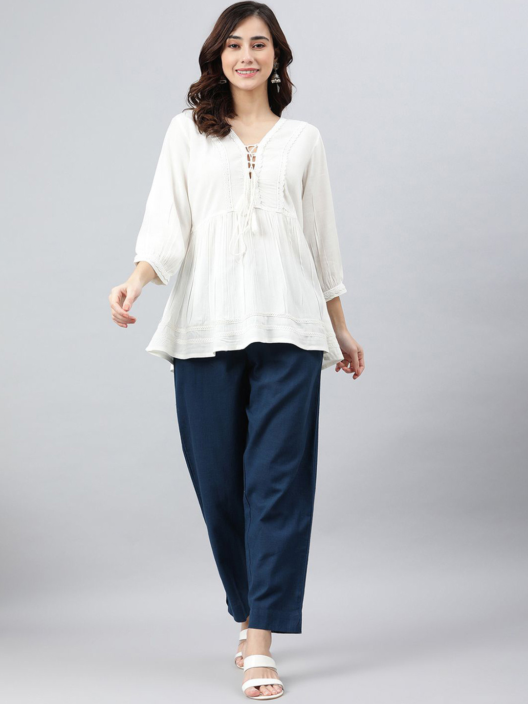 

KALINI Women Embroidered Peplum Top, White
