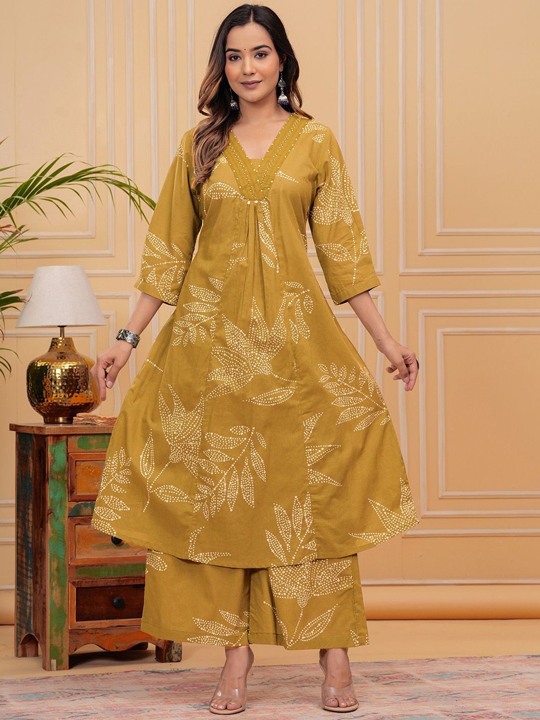 

Meena Bazaar Floral Printed Beads and Stones Kurta with Trouser, Mustard