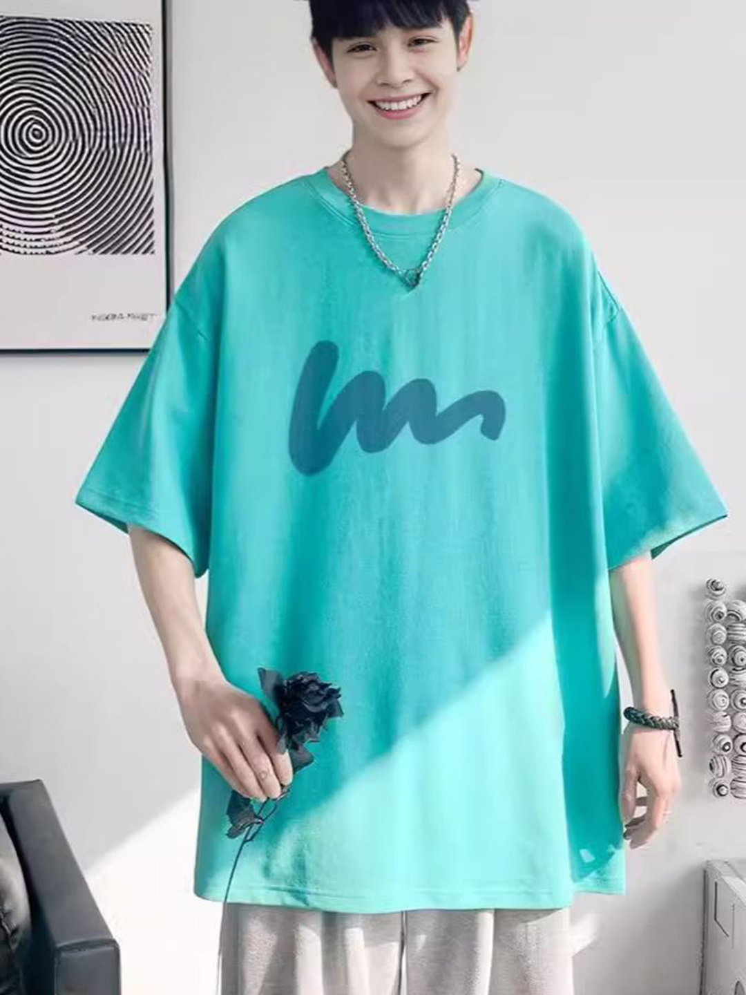 

StyleCast Men Graphic Printed Round Neck Oversized T-shirt, Sea green