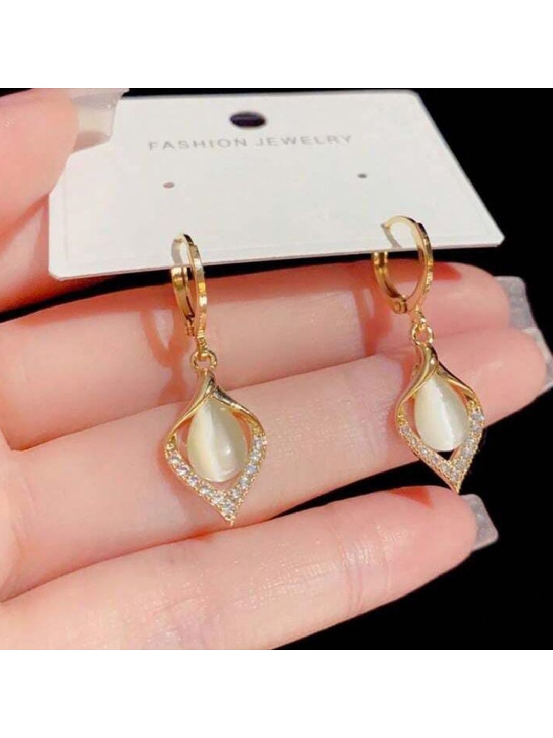 

CareDone Gold Plated Artificial Beads Studded Contemporary Drop Earrings