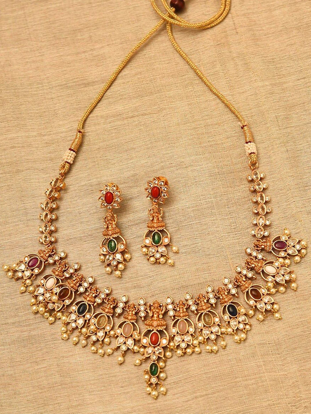 

JAYPORE Gold-Plated Stones Studded & Beaded Lakshmi Goddess Jewellery Set