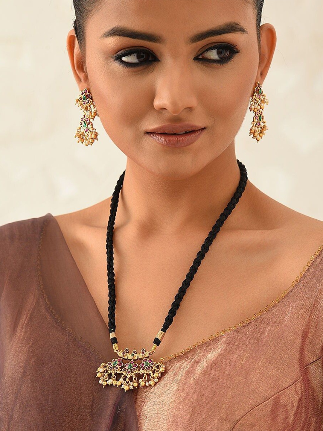 

JAYPORE Gold-Plated Brass Artificial Stones & Beads Studded Jewellery Set