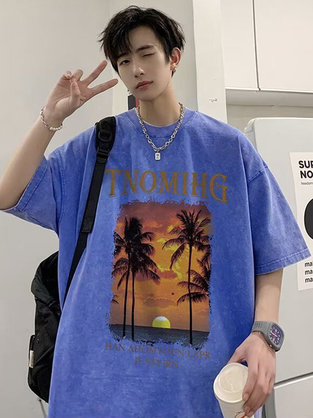

StyleCast Men Graphic Printed Round Neck Pure Cotton Oversized T-shirt, Blue