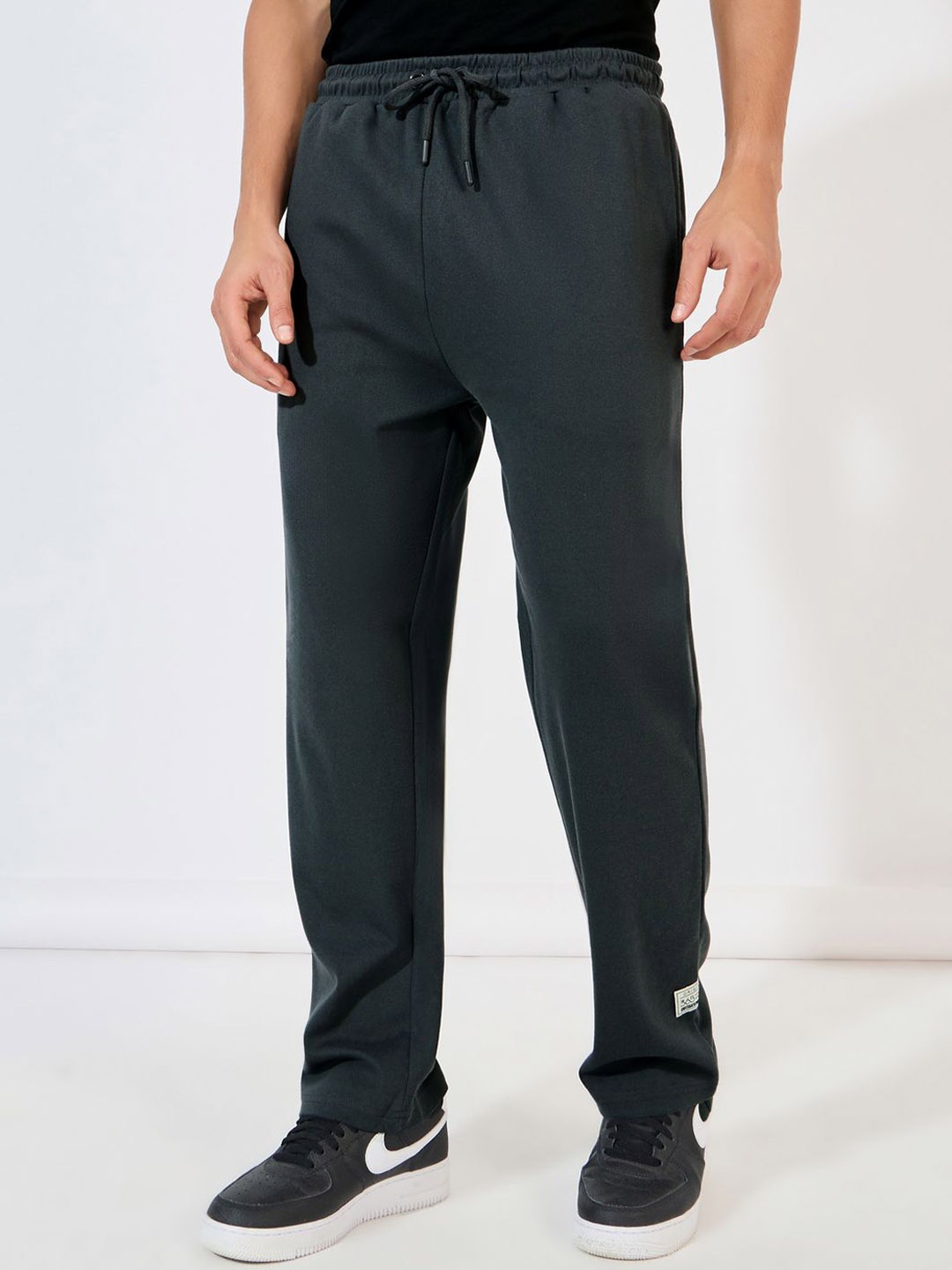 

Styli Men Badge Detail Oversized Interlock Joggers with Contrast Drawcord, Charcoal