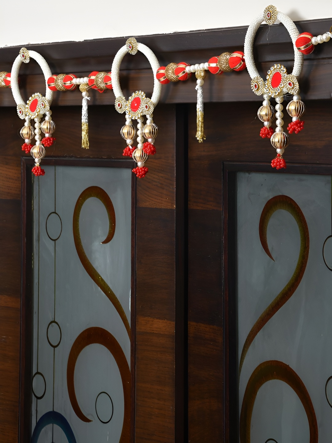 

Aapno Rajasthan White & Red Embellished Wall Door Hanging Toran