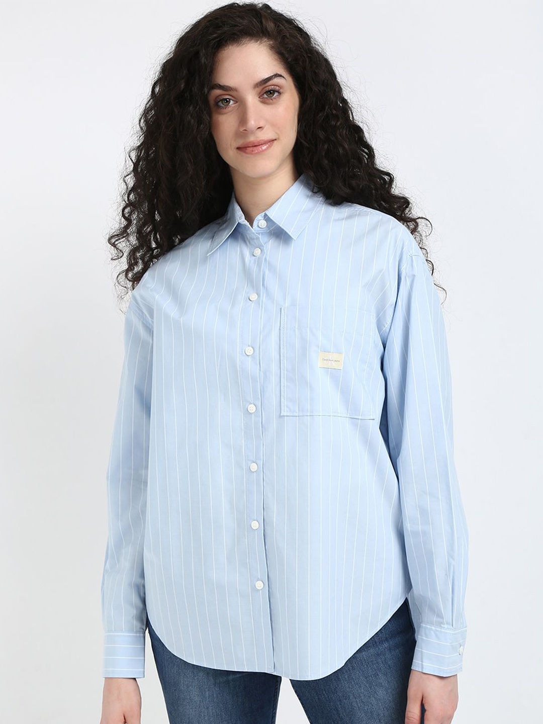 

Calvin Klein Jeans Women Cutaway Collar Vertical Striped Cotton Relaxed Fit Casual Shirt, Blue