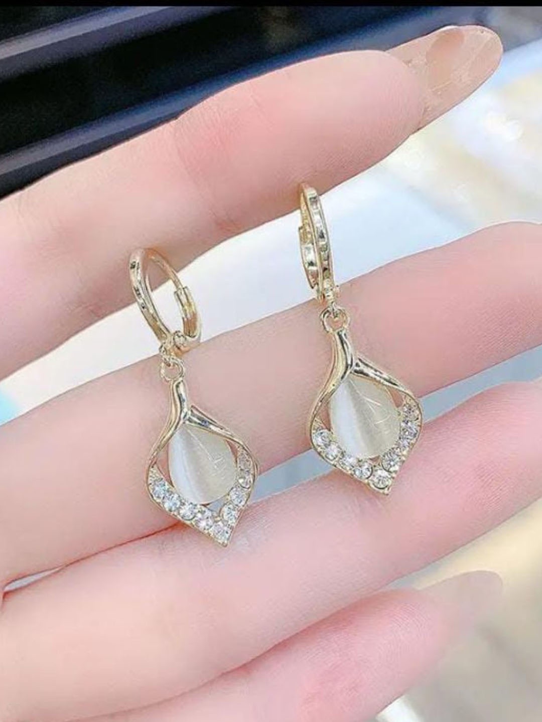 

CareDone Gold Plated Artificial Beads Studded Contemporary Drop Earrings