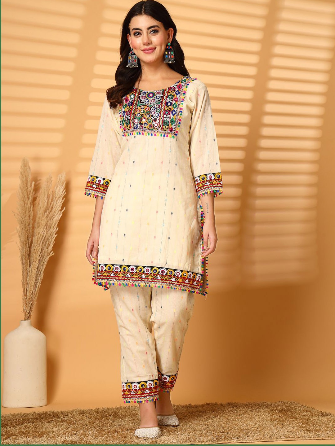 

Clora Creation Geometric Yoke Design Mirror Work Pure Cotton Straight Kurta with Trousers, Cream