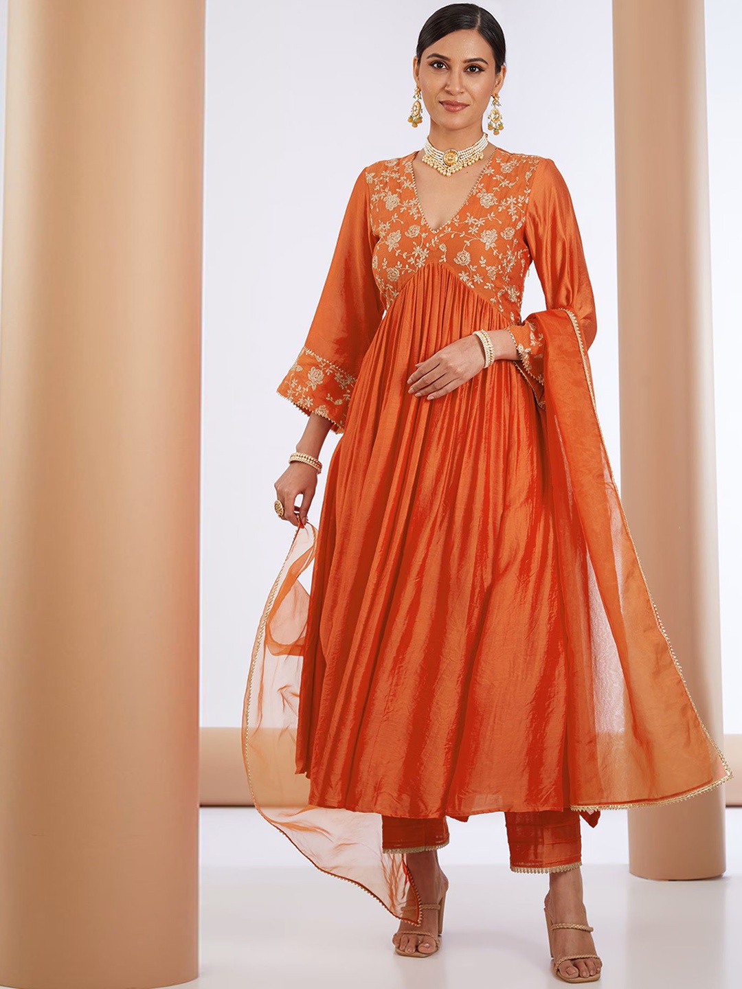 

Anni Designer Floral Embroidered Panelled Anarkali Kurta with Trousers & Dupatta, Orange