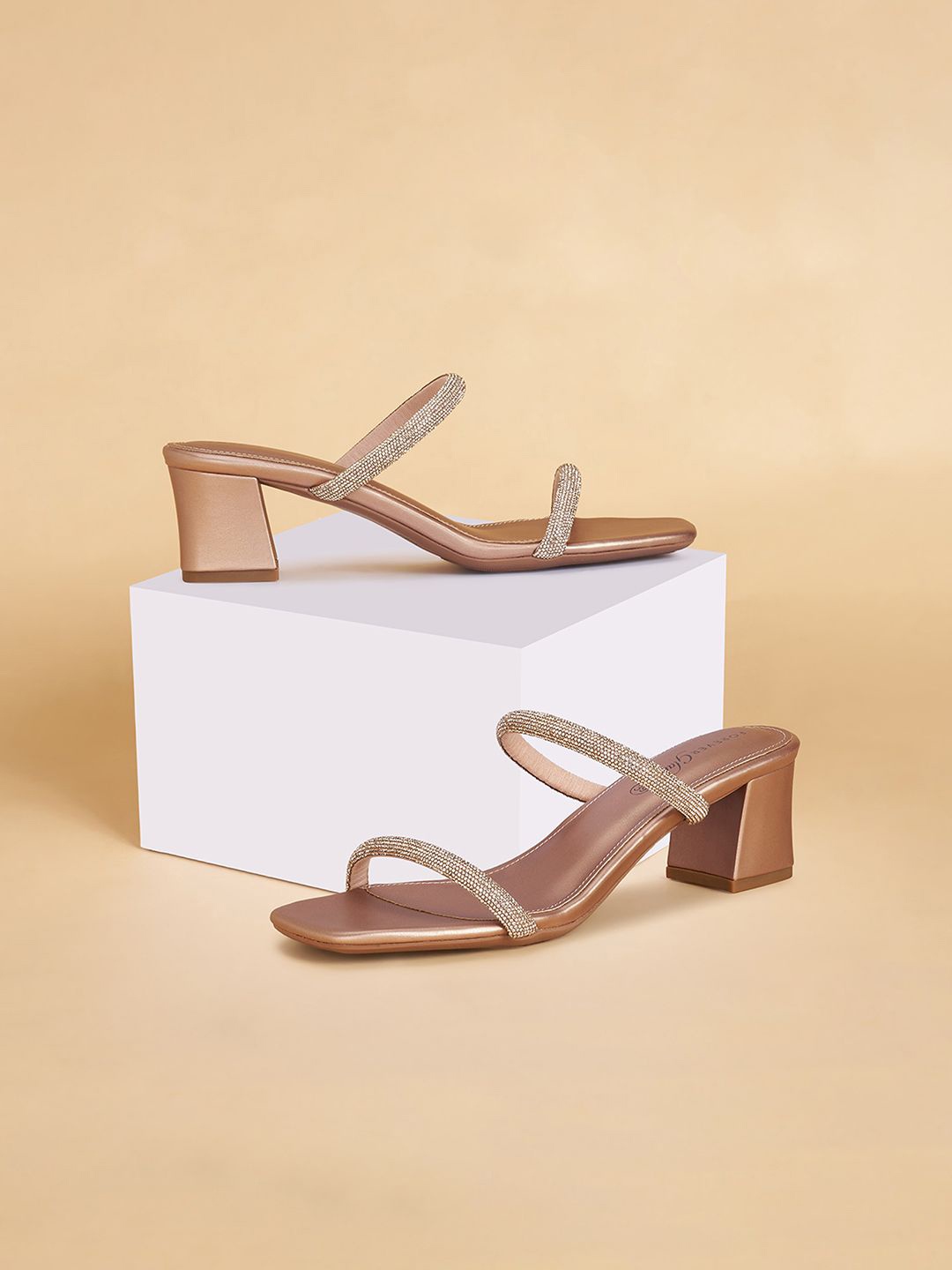 

Forever Glam by Pantaloons Women Textured Suede Ethnic Block Sandals with Bows, Rose gold