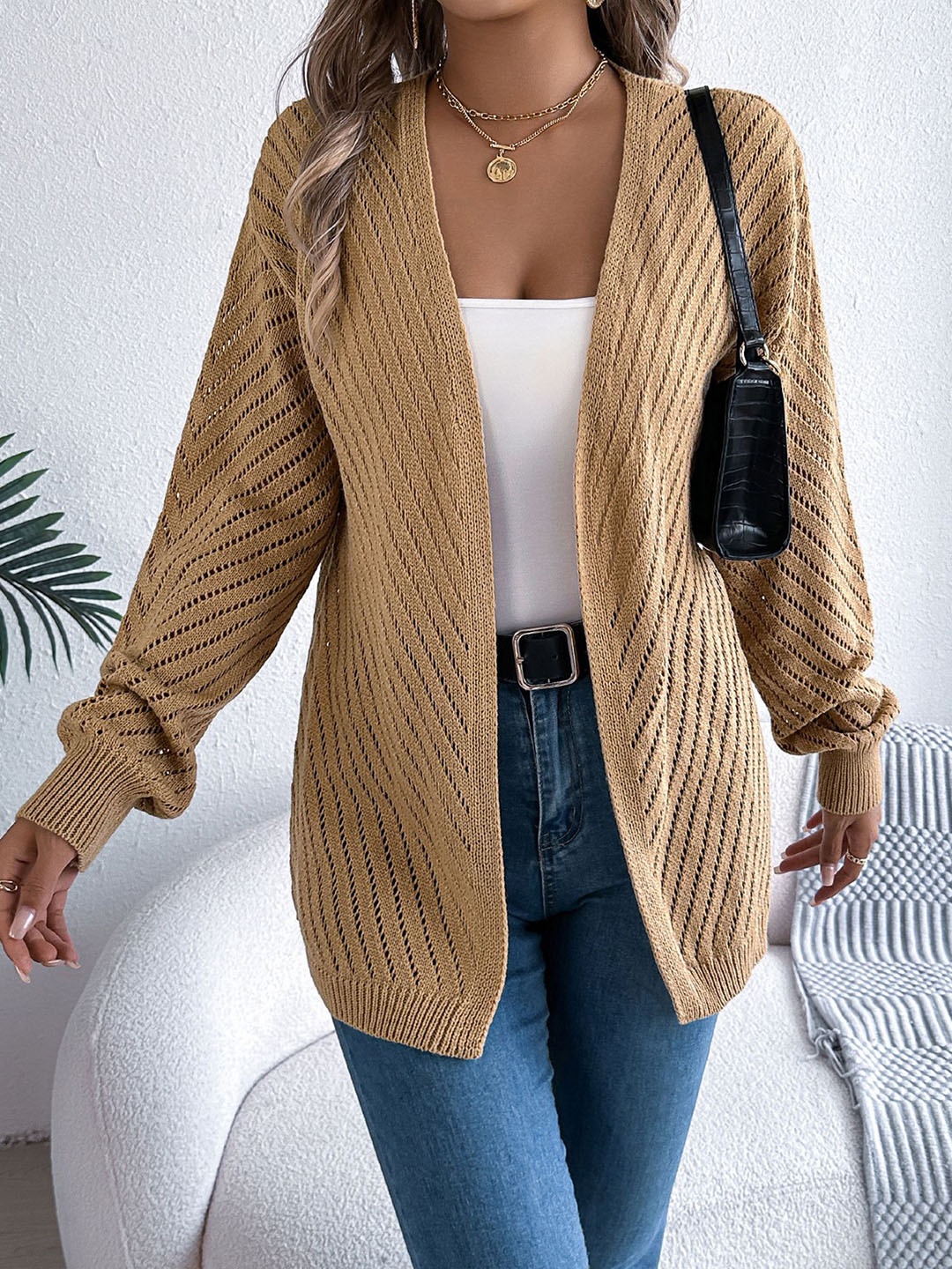 

StyleCast x Revolte Khaki Coloured Self Design Open Front Acrylic Shrug