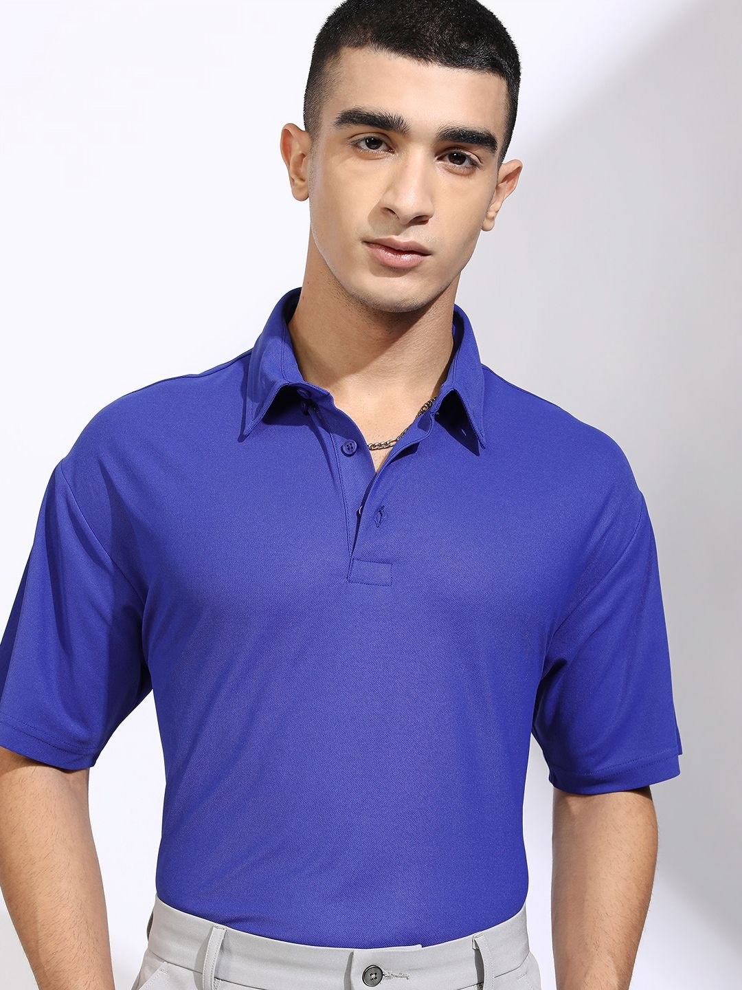 

HIGHLANDER Men Solid Polo Collar Relaxed Fit T-shirt, Blue