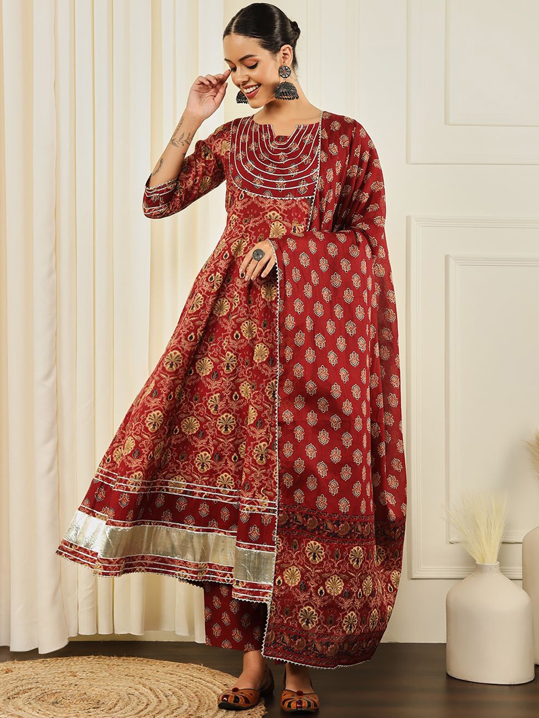 

Meeranshi Ethnic Motifs Printed Gotta Patti Cotton Anarkali Kurta With Trousers & Dupatta, Maroon