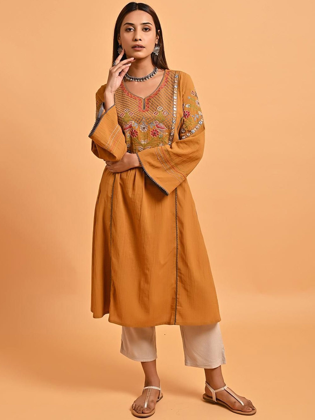 

Lakshita Floral Embroidered Mirror Work Cotton A-Line Kurta, Mustard