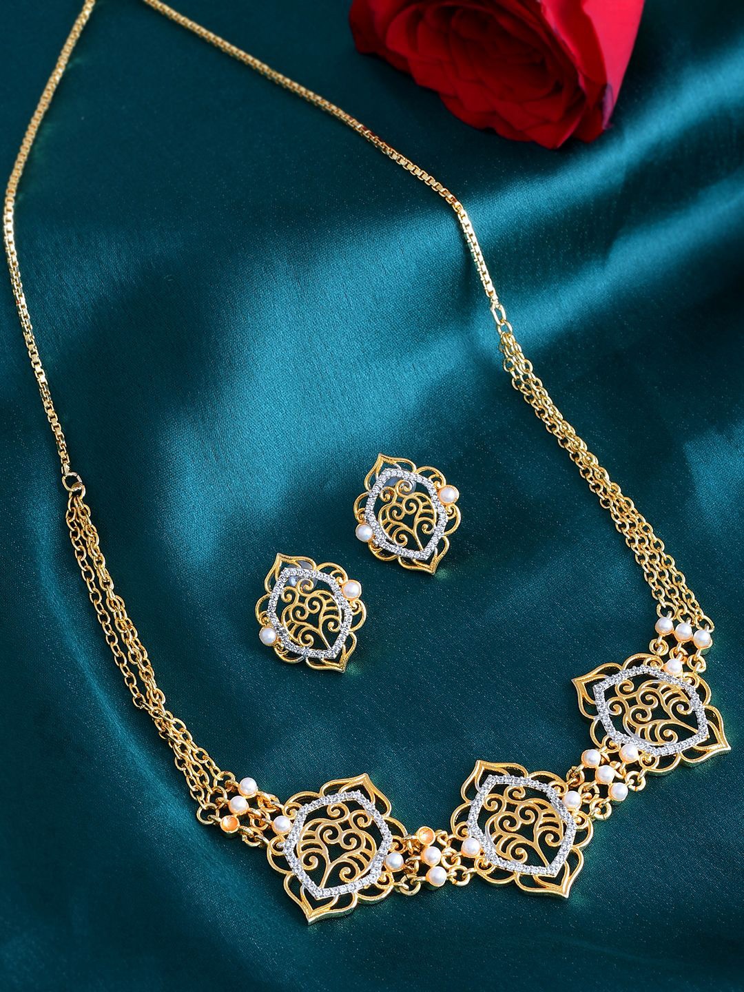 

Voylla Alpana Opulent Jaali Gold-Plated American Diamond-Studded Jewellery Set