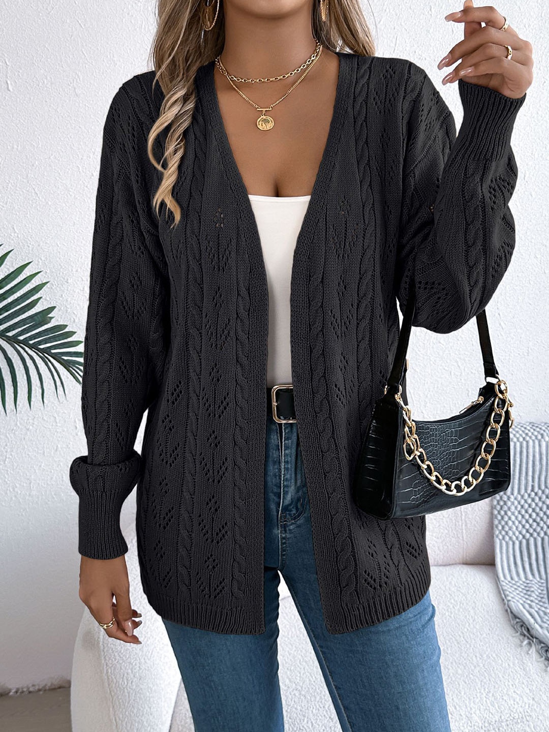 

StyleCast x Revolte Black Self Design Open Front Acrylic Shrug