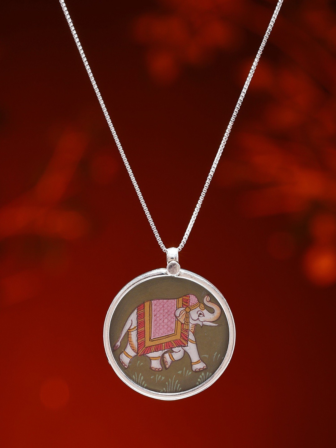 

Exotic India Stainless Steel Silver-Plated Circular Royal Elephant Pendant