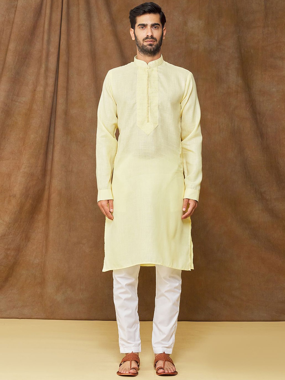 

Samyukta Singhania Yoke Design Mandarin Collar Kurta With Trousers, Yellow