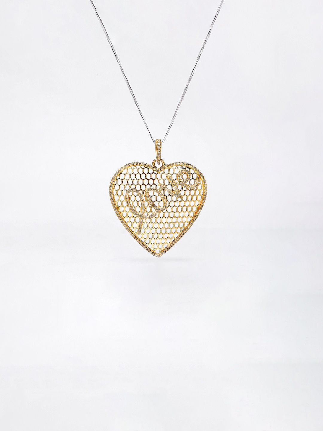 

Exotic India Gold Plated Sterling Silver Heart Shape Pendant with Diamond