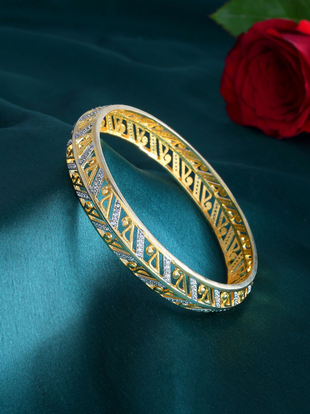 

Voylla Gold Plated Alpana Timeless Elegance American Diamond Stone Studded Bangle