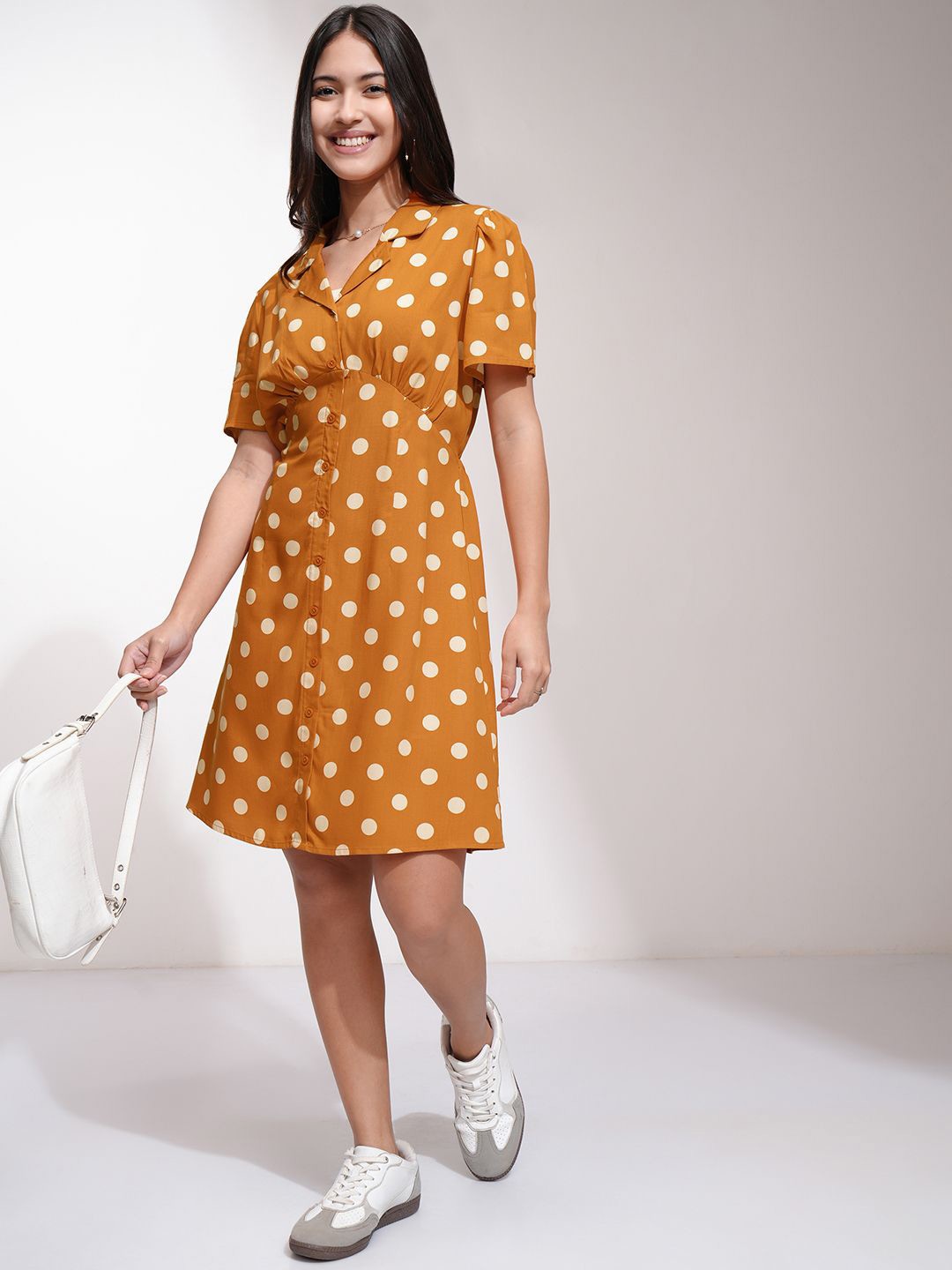 

Tokyo Talkies Women Polka Dot Print A-Line Mini Dress, Rust