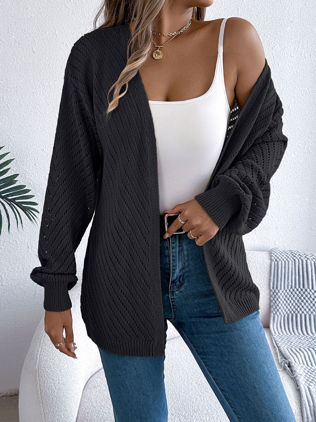 

StyleCast x Revolte Black Open Front Acrylic Shrug