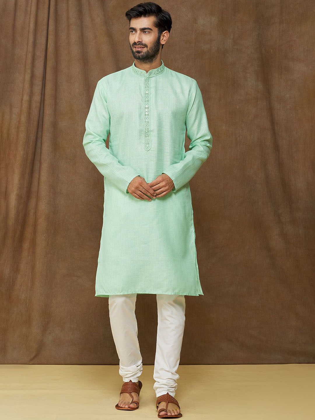 

Samyukta Singhania Yoke Design Mandarin Collar Thread Work Straight Kurta With Churidar, Green