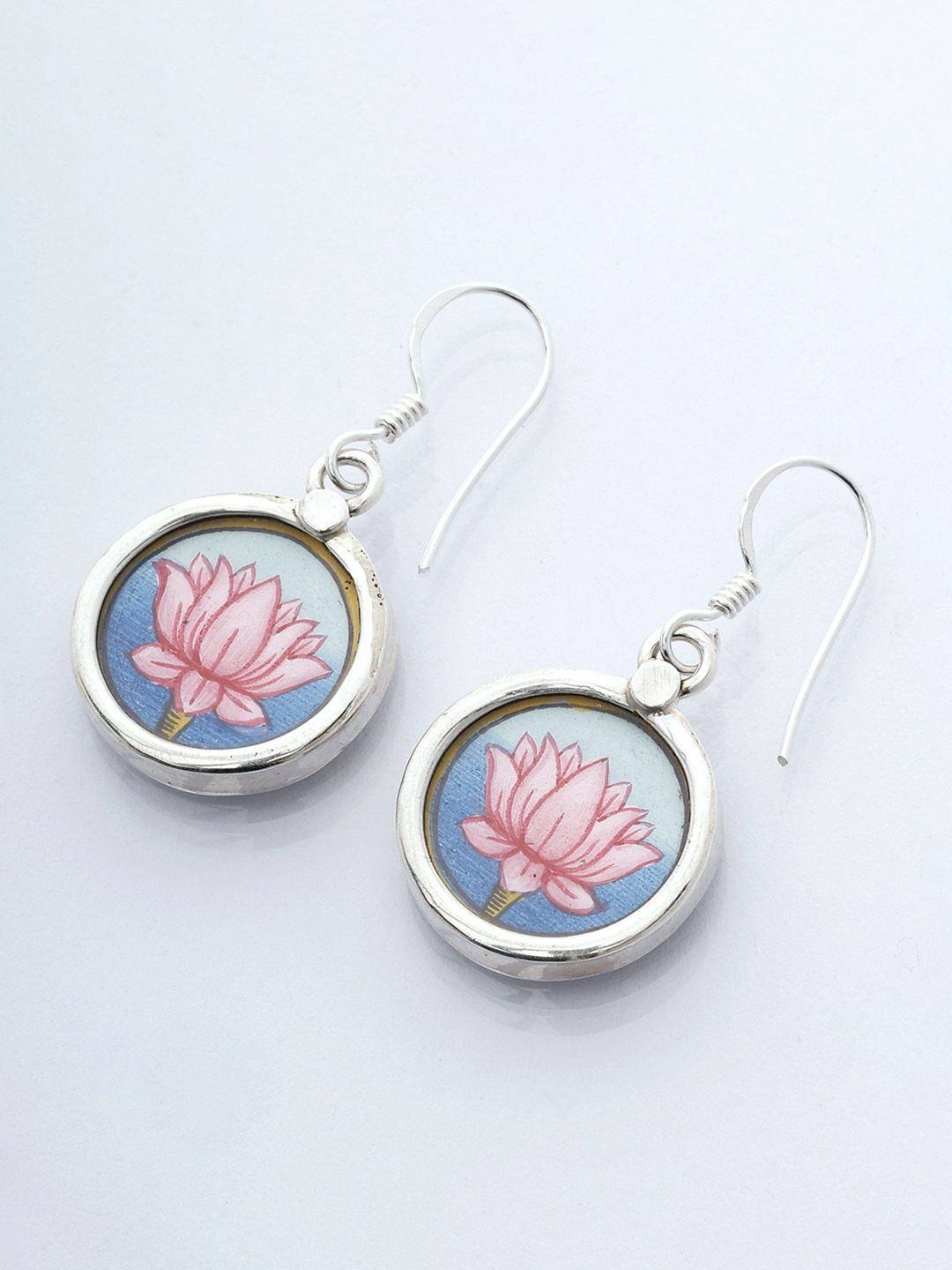 

Exotic India Round Shape Sterling Silver Lotus Design Earrings
