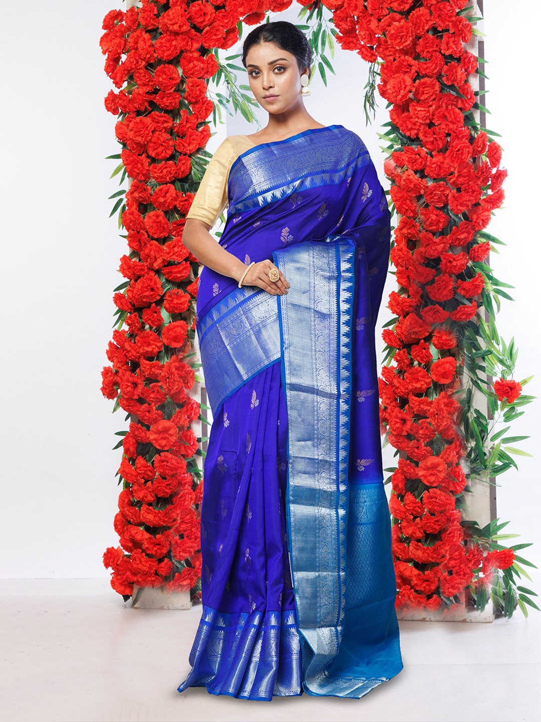 

Unnati Silks Woven Design Zari Pure Assam Silk Handloom Kanjeevaram Saree, Blue