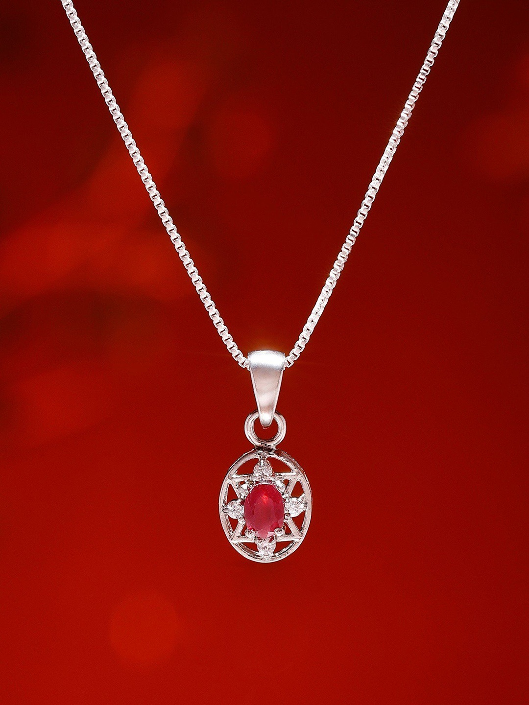 

Exotic India Octagon Star Shaped Ruby Pendant in Sterling Silver