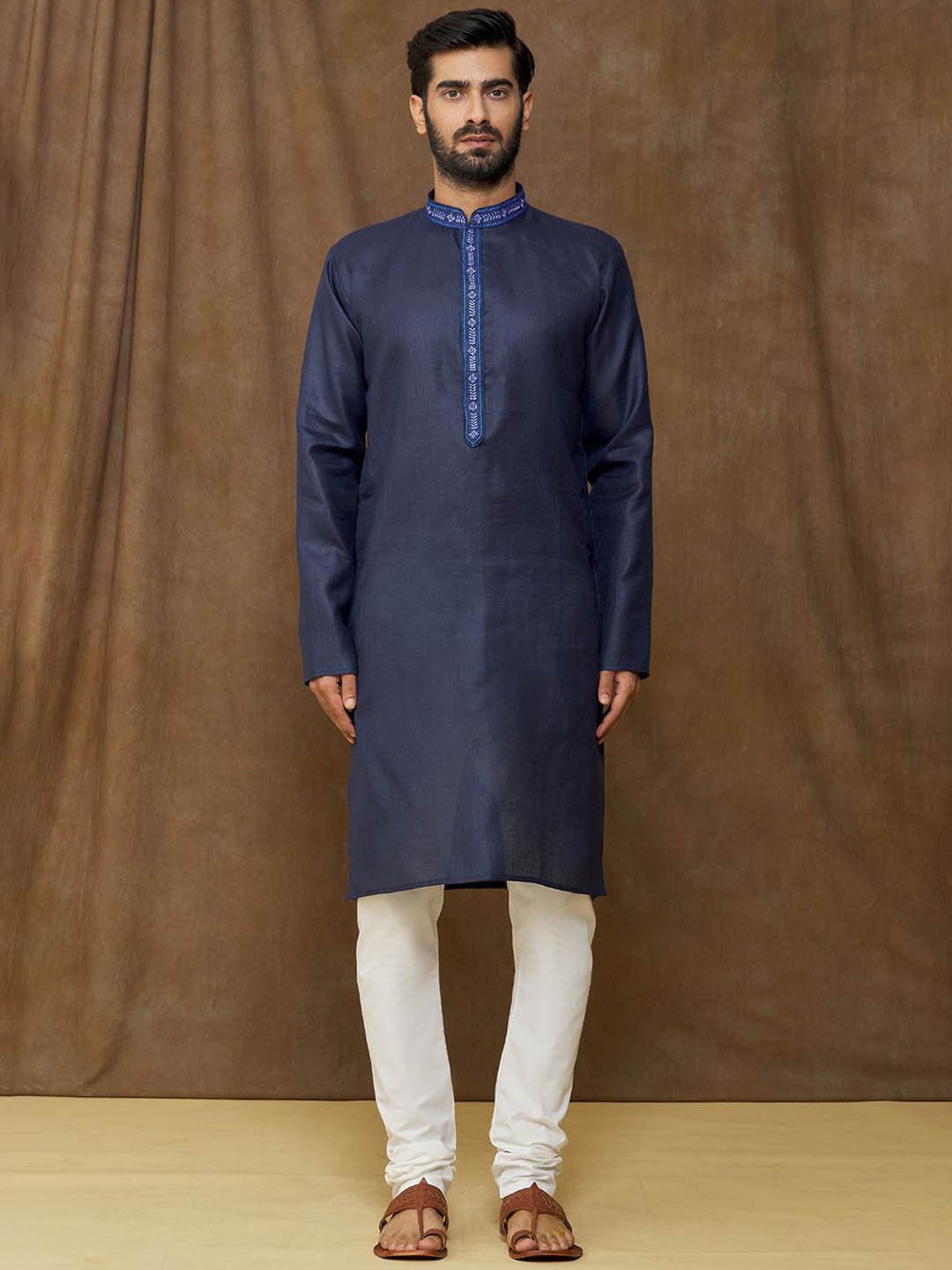 

Samyukta Singhania Mandarin Collar Long Sleeves Regular Thread Work Kurta & Trouser, Navy blue