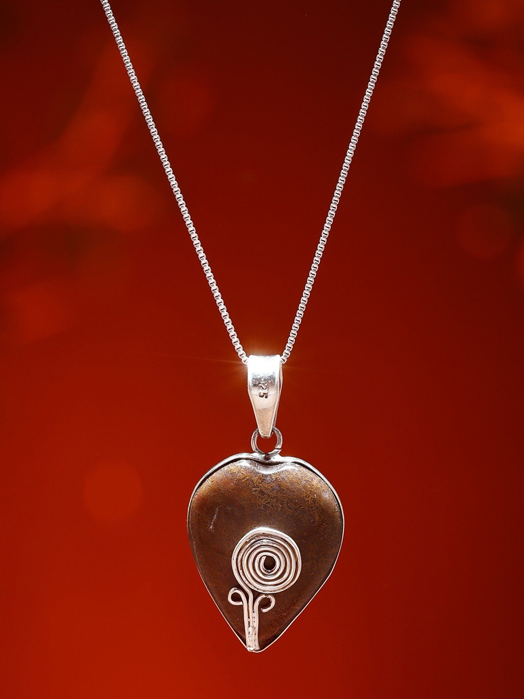 

Exotic India Sterling Silver Pendant with Bronzite Gemstone