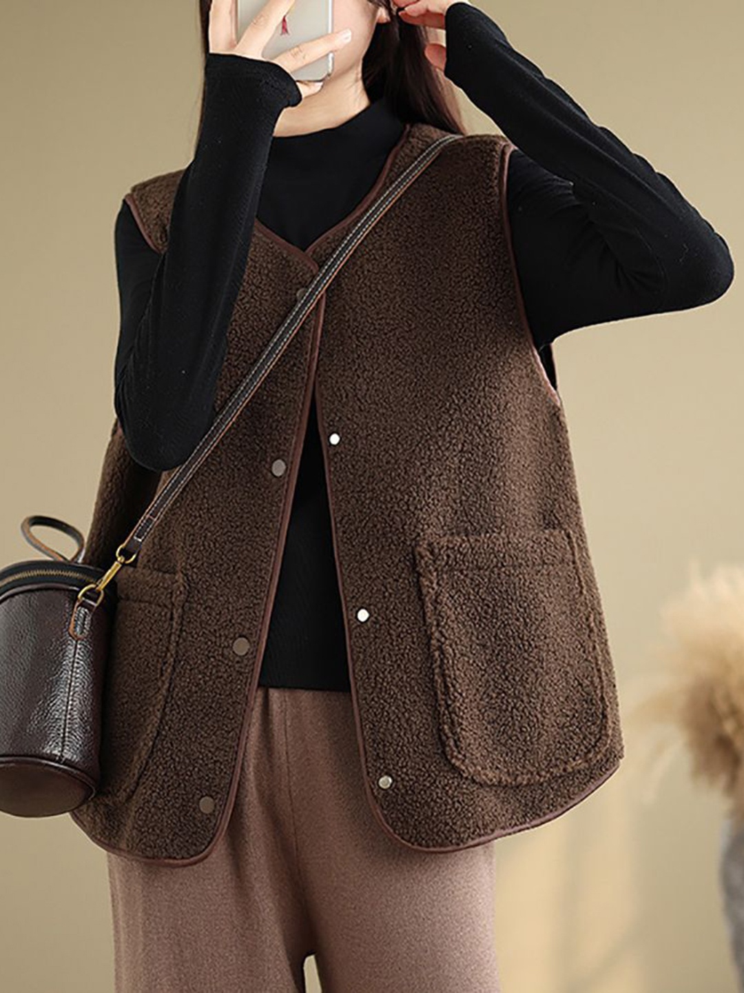 

StyleCast x Revolte Coffee Brown Sleeveless Jacket