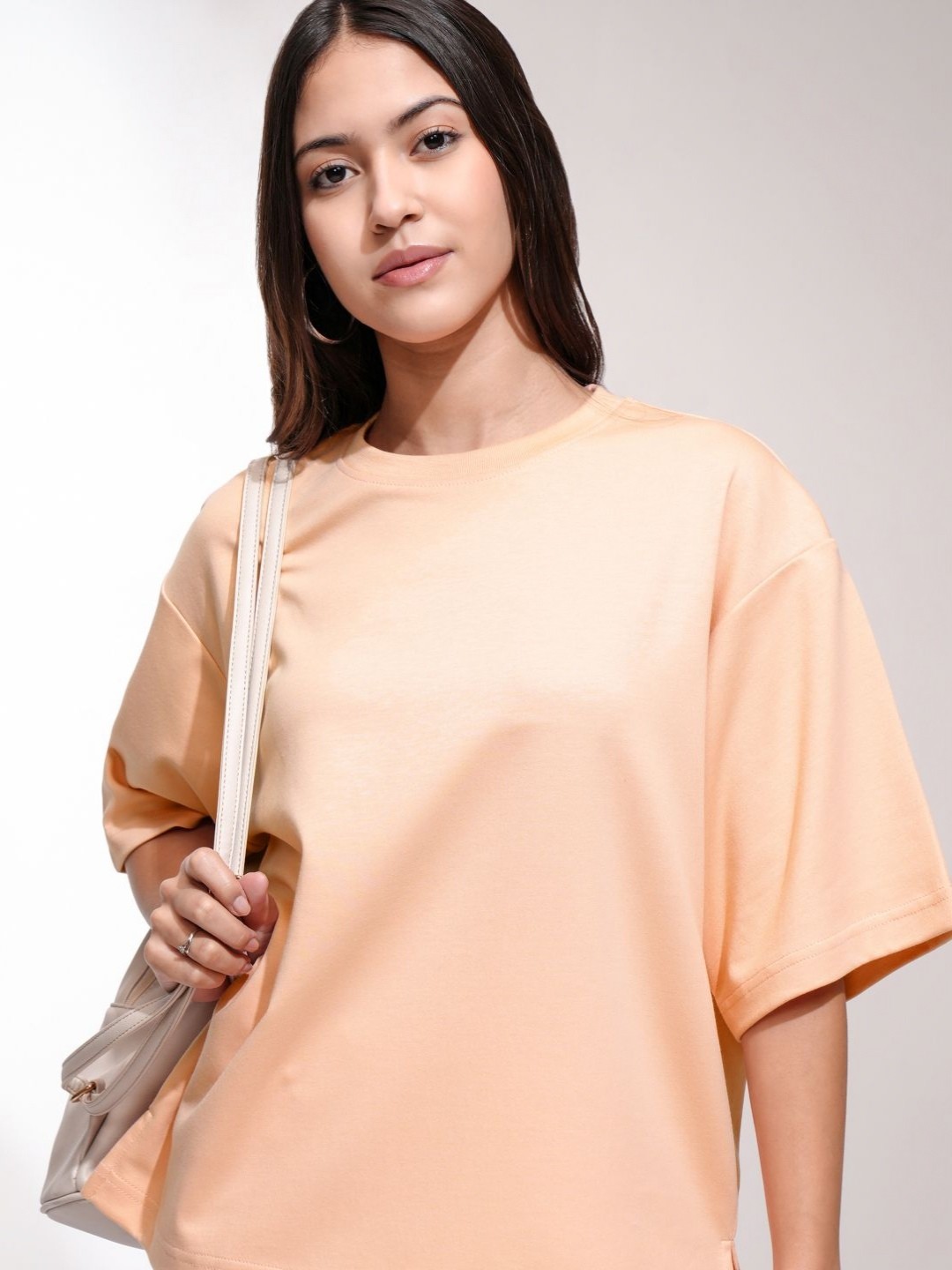 

Tokyo Talkies Women Solid Round Neck Cotton Oversized T-shirt, Peach