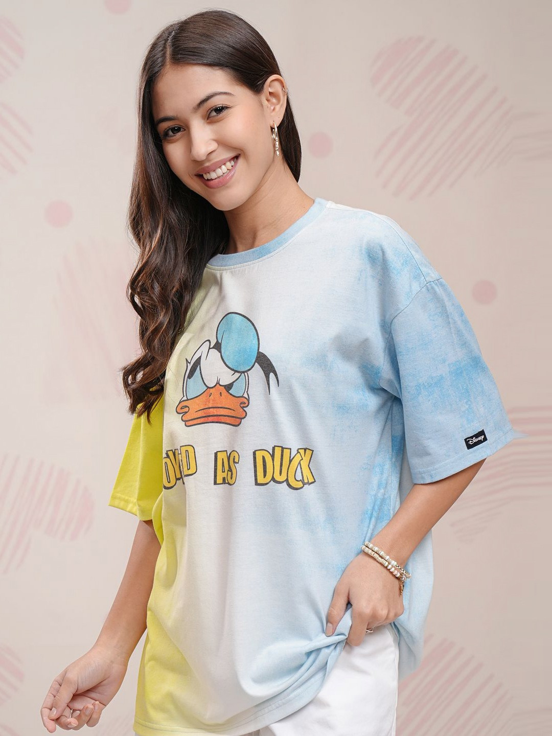 

Tokyo Talkies Women Graphic Printed Round Neck Oversized Donald Duck Tshirt, Yellow