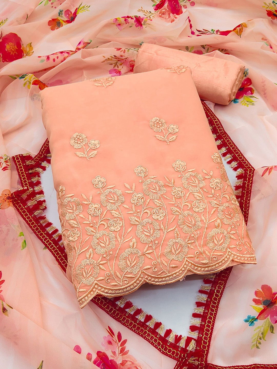 

Maroosh Embroidered Thread Work Unstitched Dress Material, Peach