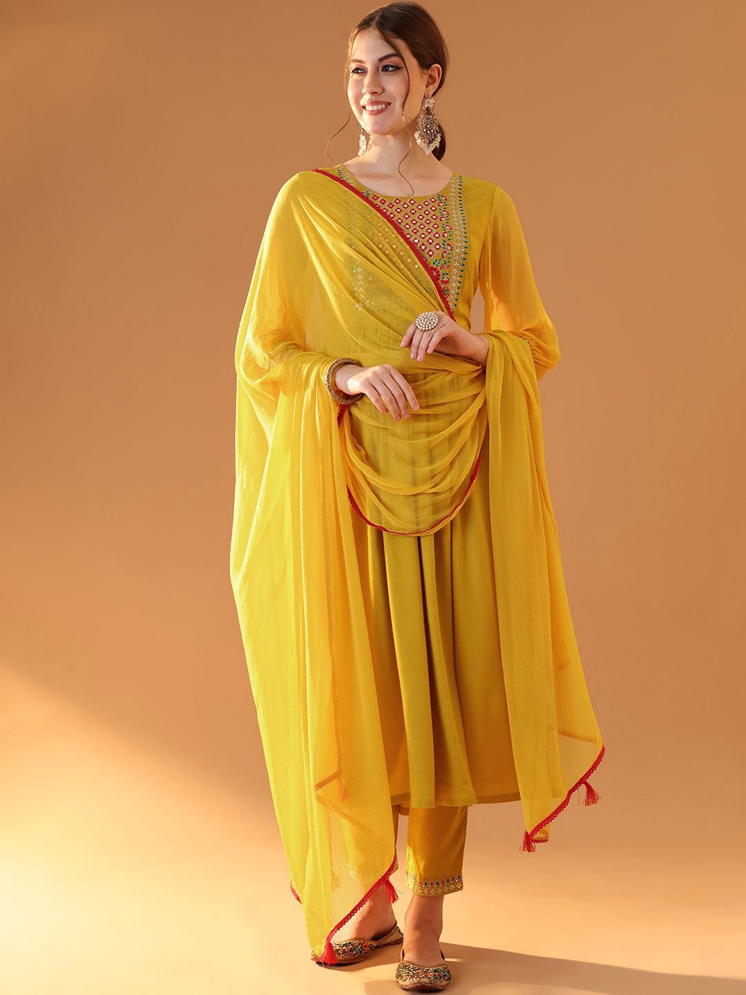

Tulsattva Floral Embroidered Regular Mirror Work Anarkali Kurta With Trouser With Dupatta, Mustard