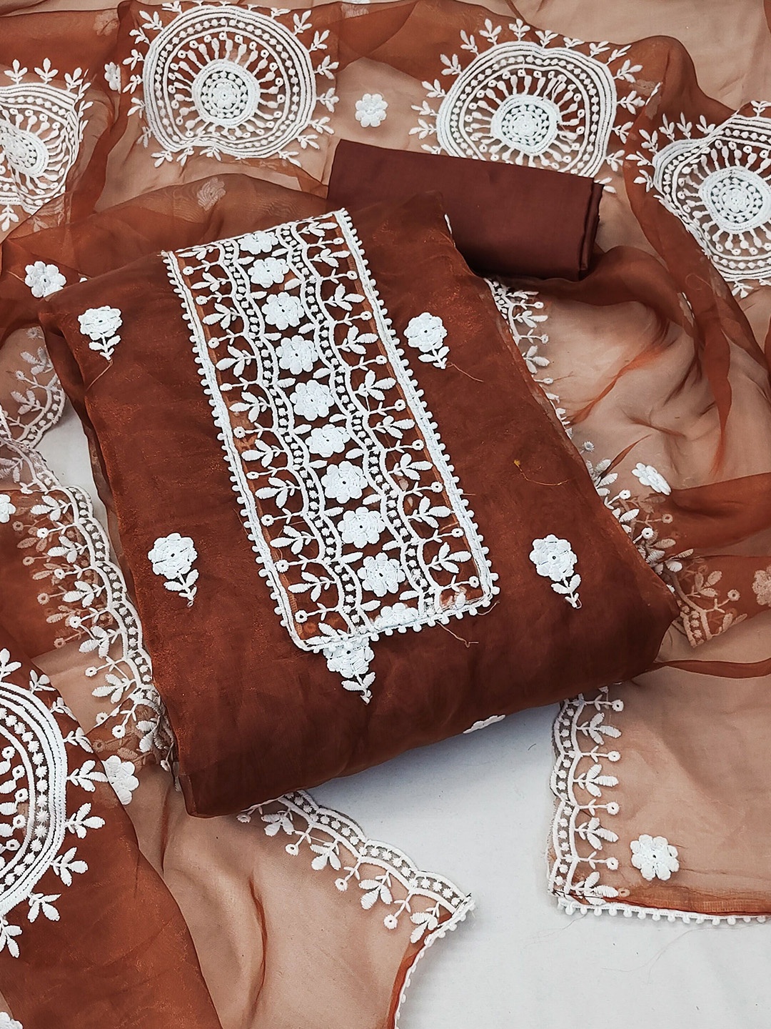 

Maroosh Embroidered Thread Work Organza Unstitched Dress Material, Rust