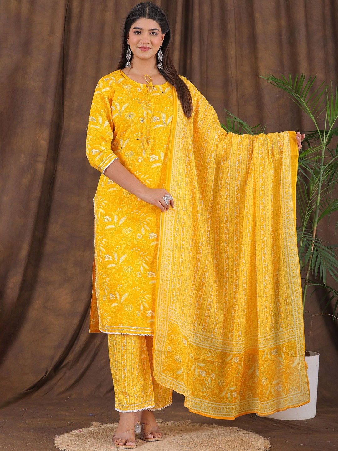 

PARTHVI Floral Printed Tie-Up Neck Straight Kurta with Trousers & Dupatta, Yellow