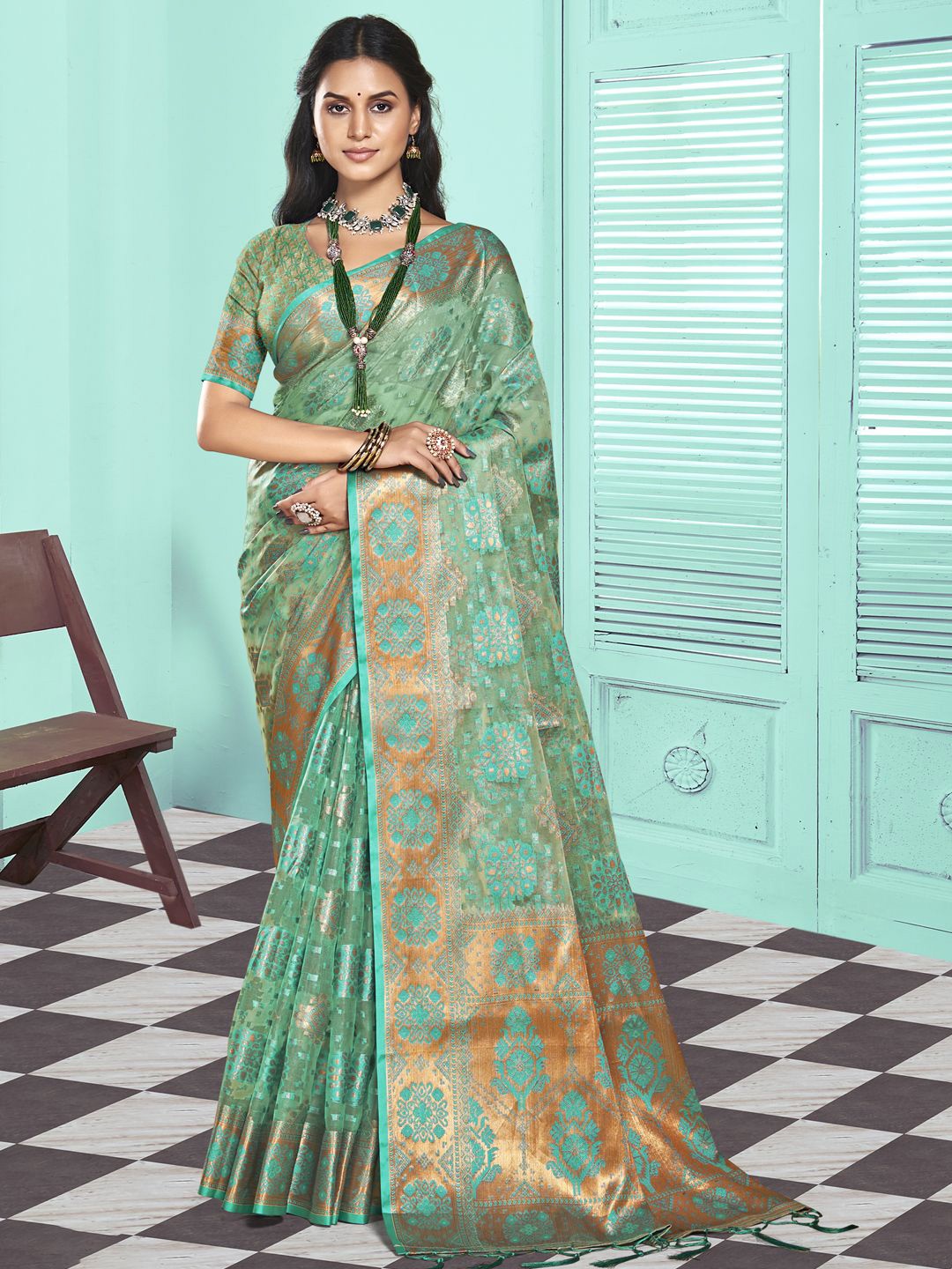 

Ishin Woven Design Zari Organza Saree, Turquoise blue