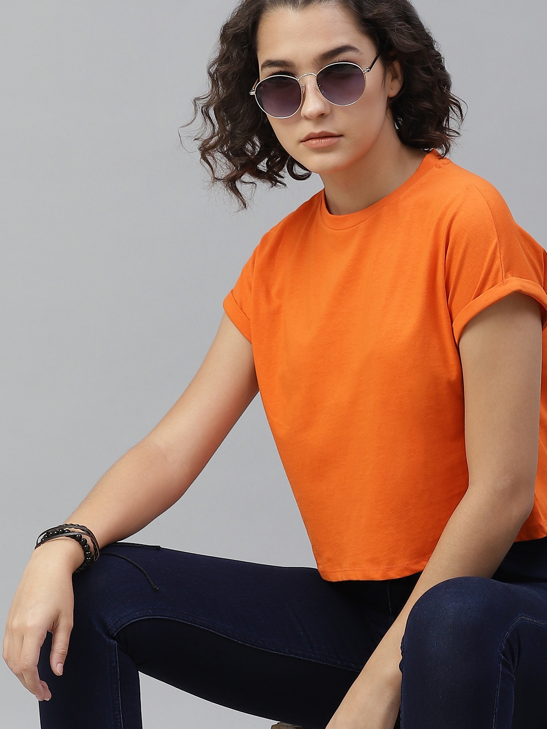 

The Roadster Lifestyle Co Women Orange Solid Round Neck Pure Cotton Crop T-shirt