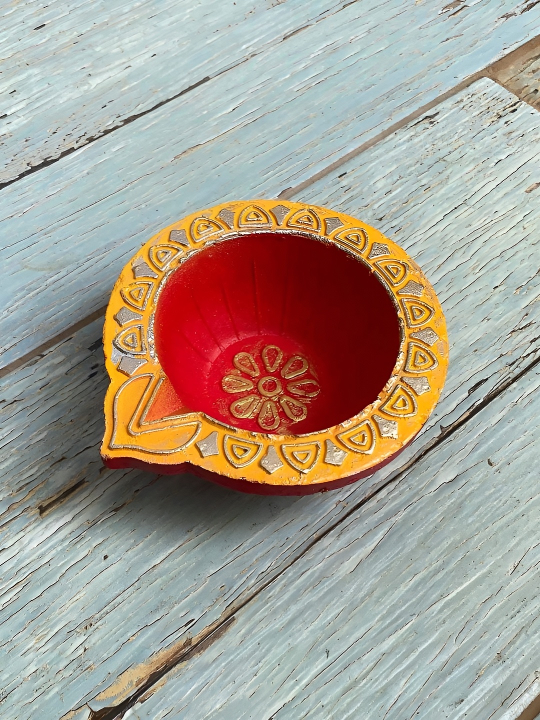 

Ariana Yellow & Red Terracota Akhand Diya