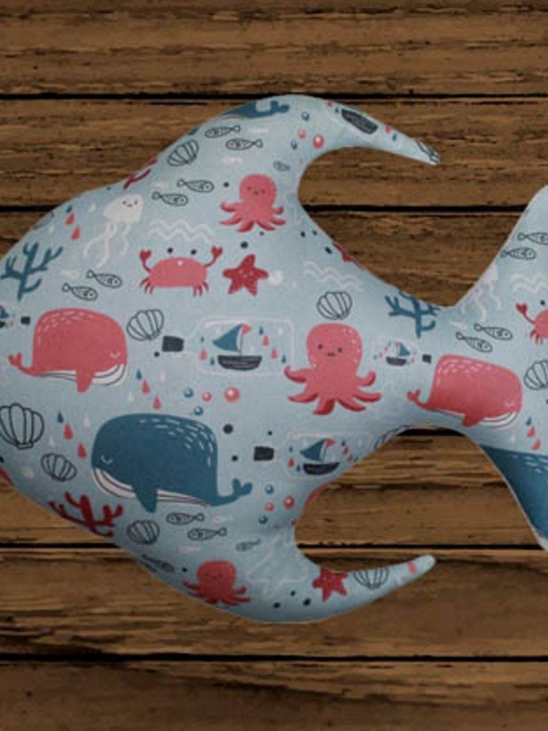 

Lushomes Blue & Red Printed Fish Shape Pre Filled Cushions