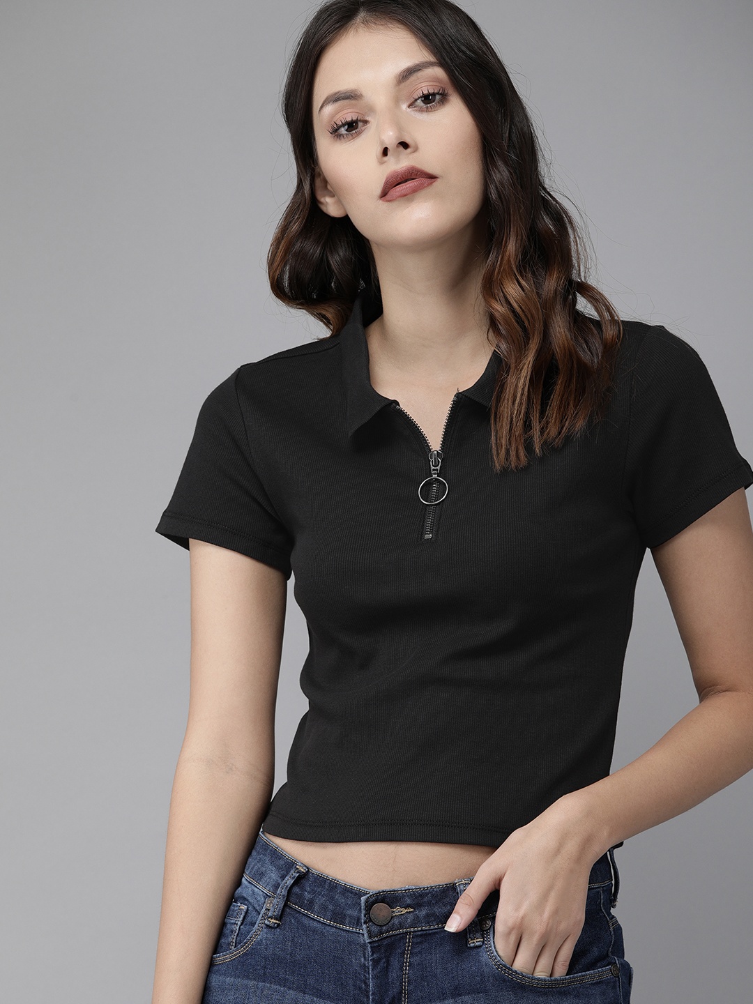 

Roadster Women Black Solid Polo Collar T-shirt