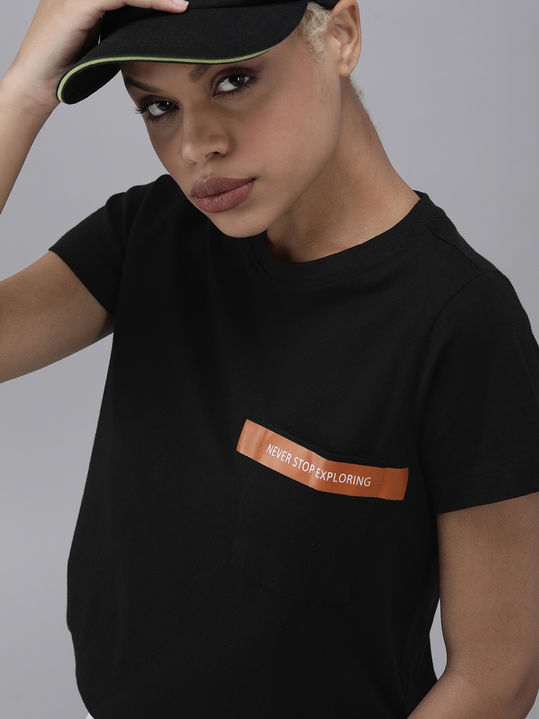 

Roadster Women Black & Orange Typography Printed Casual T-shirt