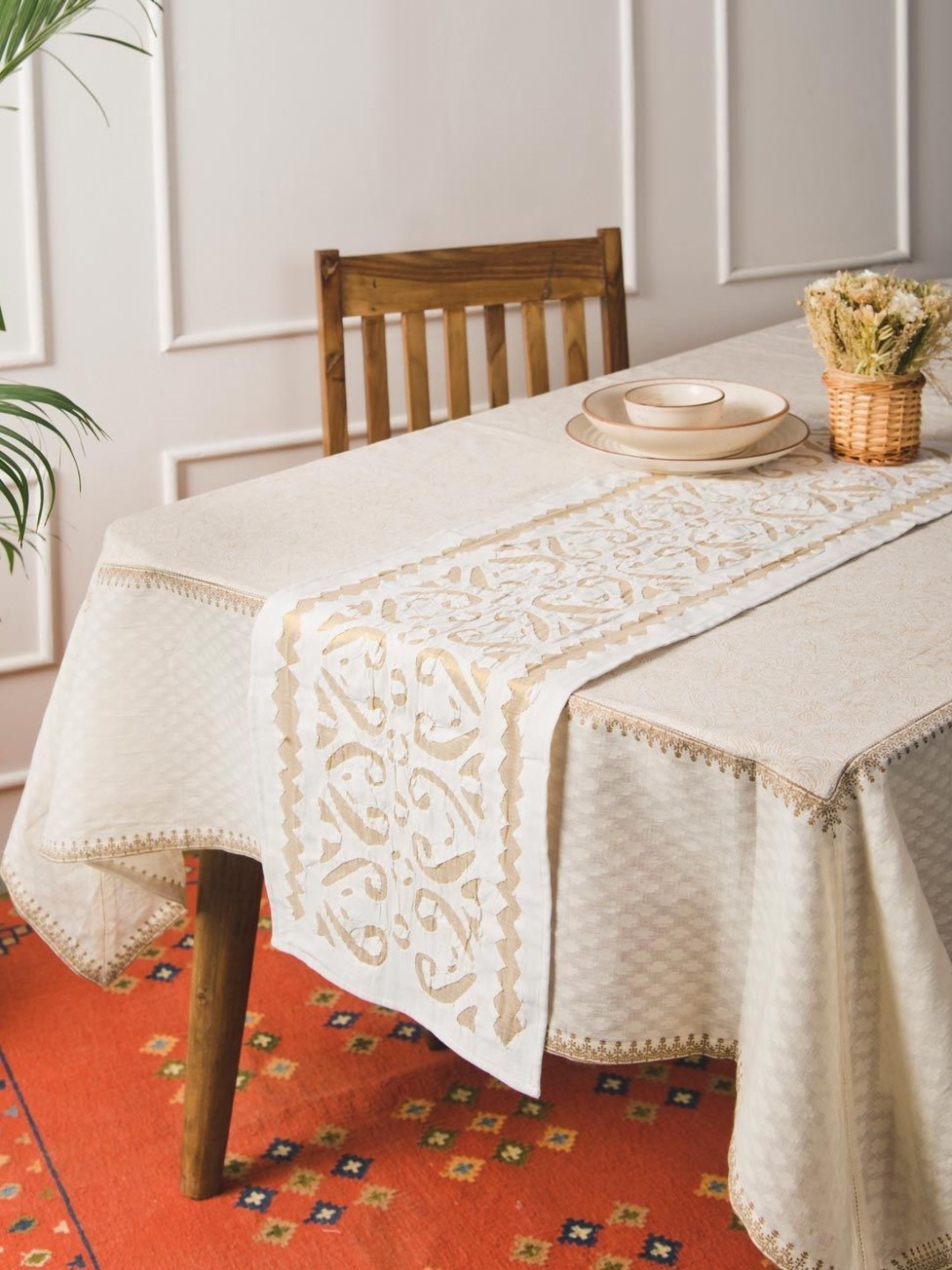 

Fabindia White & Gold-Toned Floral Embroidered Rectangular Shaped Table Runner