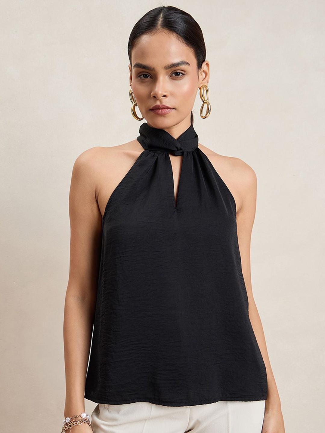 

FEMMELLA Solid Halter Neck Sleeveless Regular Top, Black