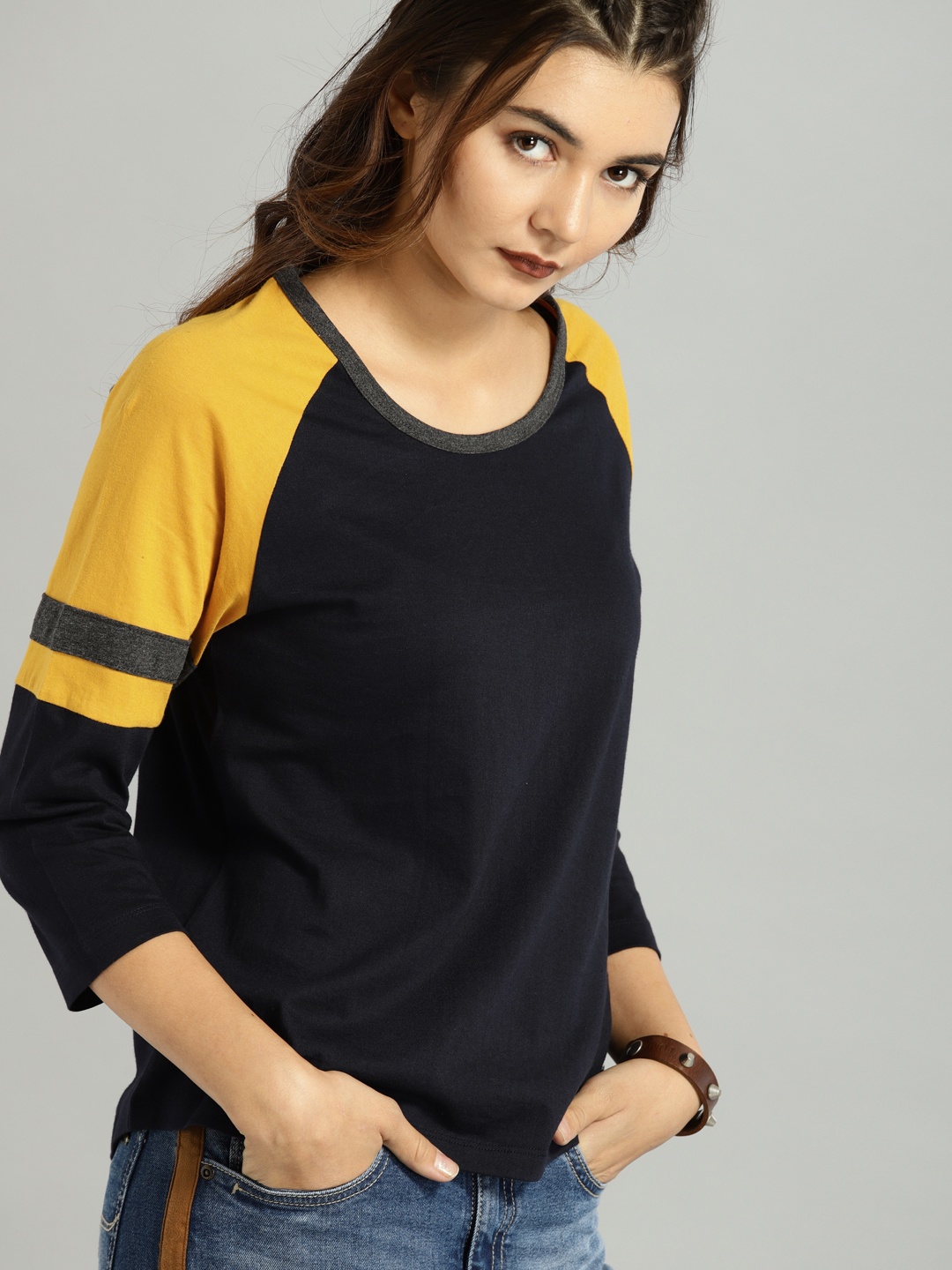 

Roadster Women Navy Blue Solid T-shirt